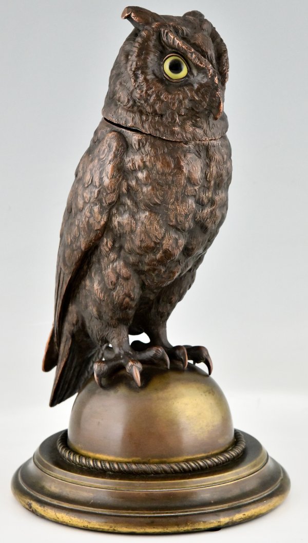 Large antique owl tobacco jar.