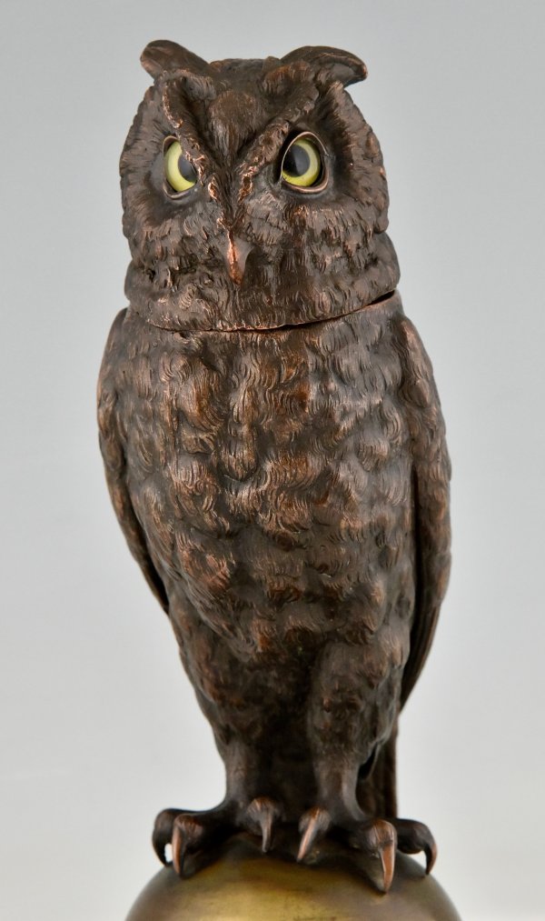 Large antique owl tobacco jar.