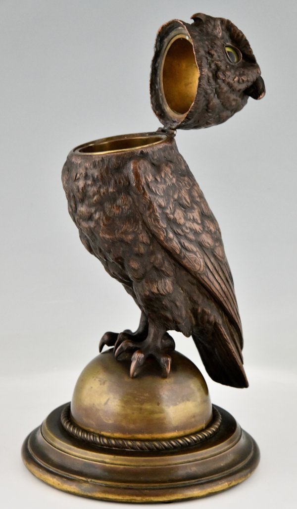 Large antique owl tobacco jar.