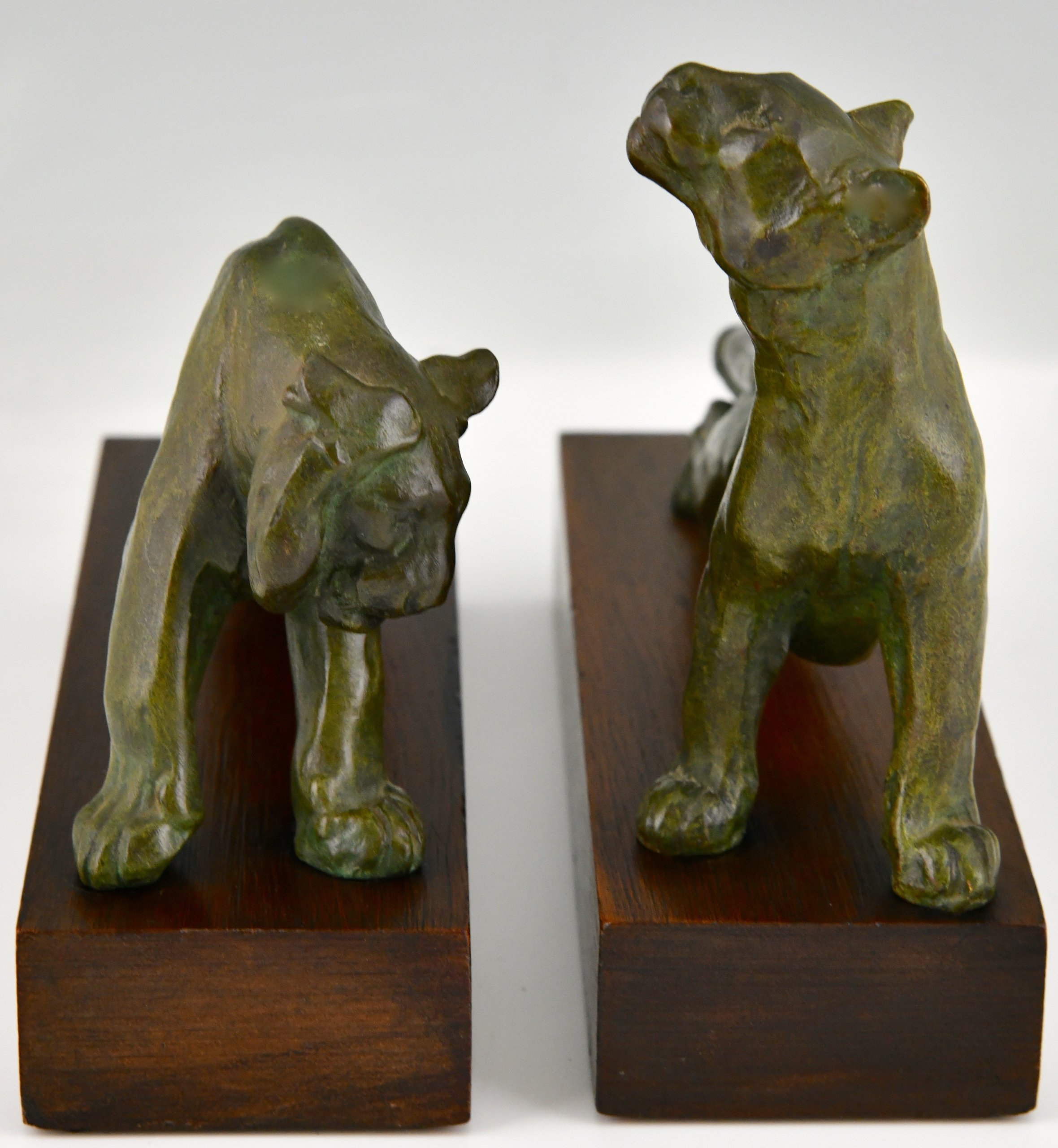 Art Deco bronzen boekensteunen panter en tijger