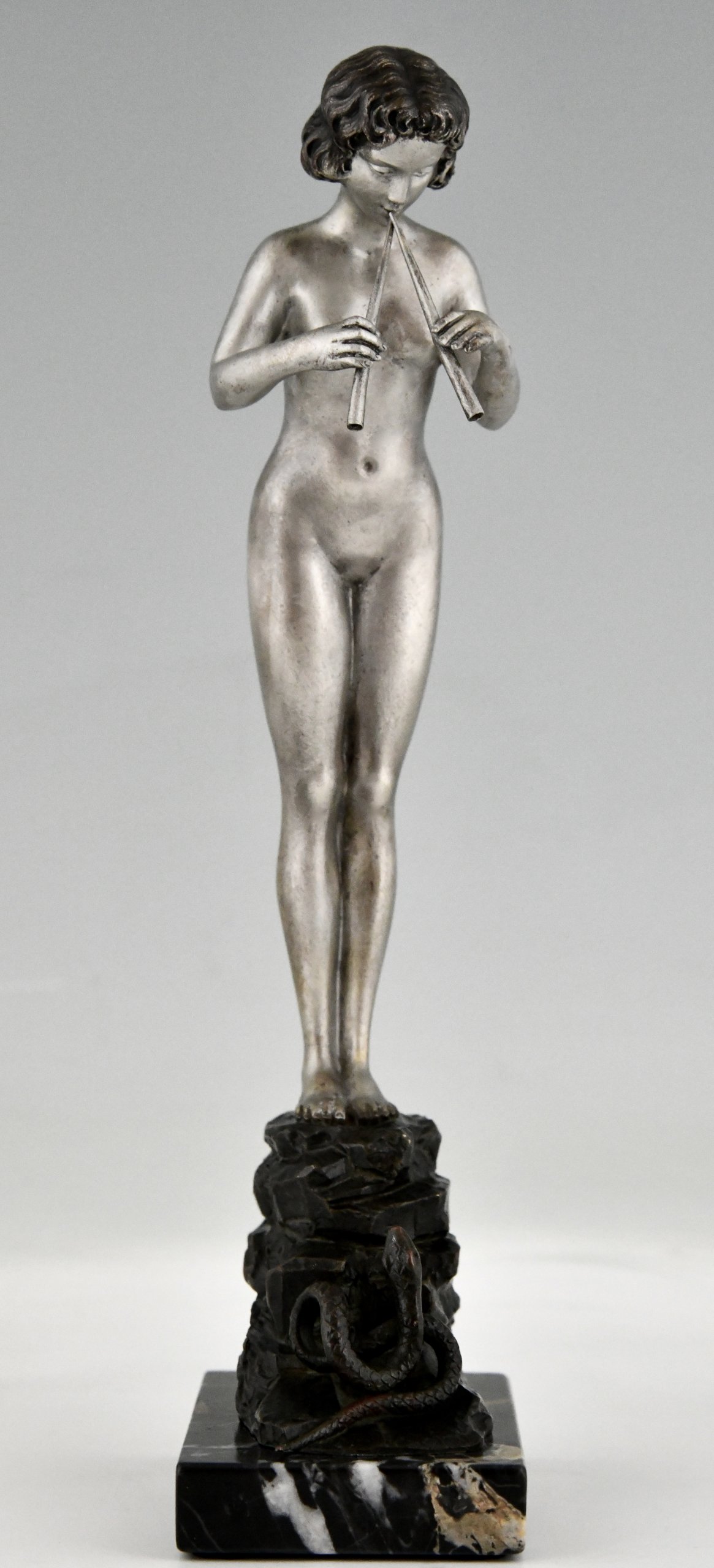 Art Nouveau bronze sculpture nude snake charmer.