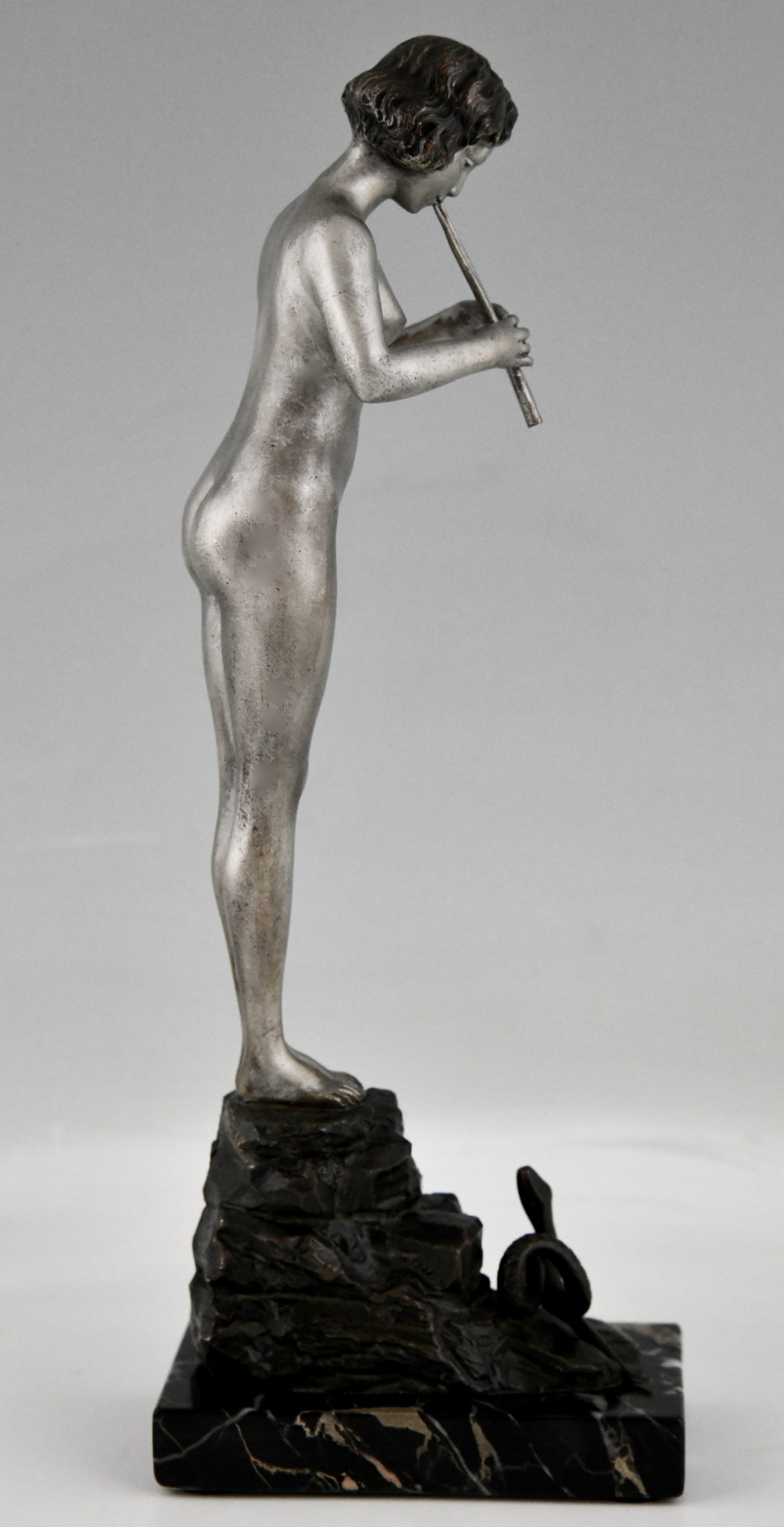 Art Nouveau bronze sculpture nude snake charmer.