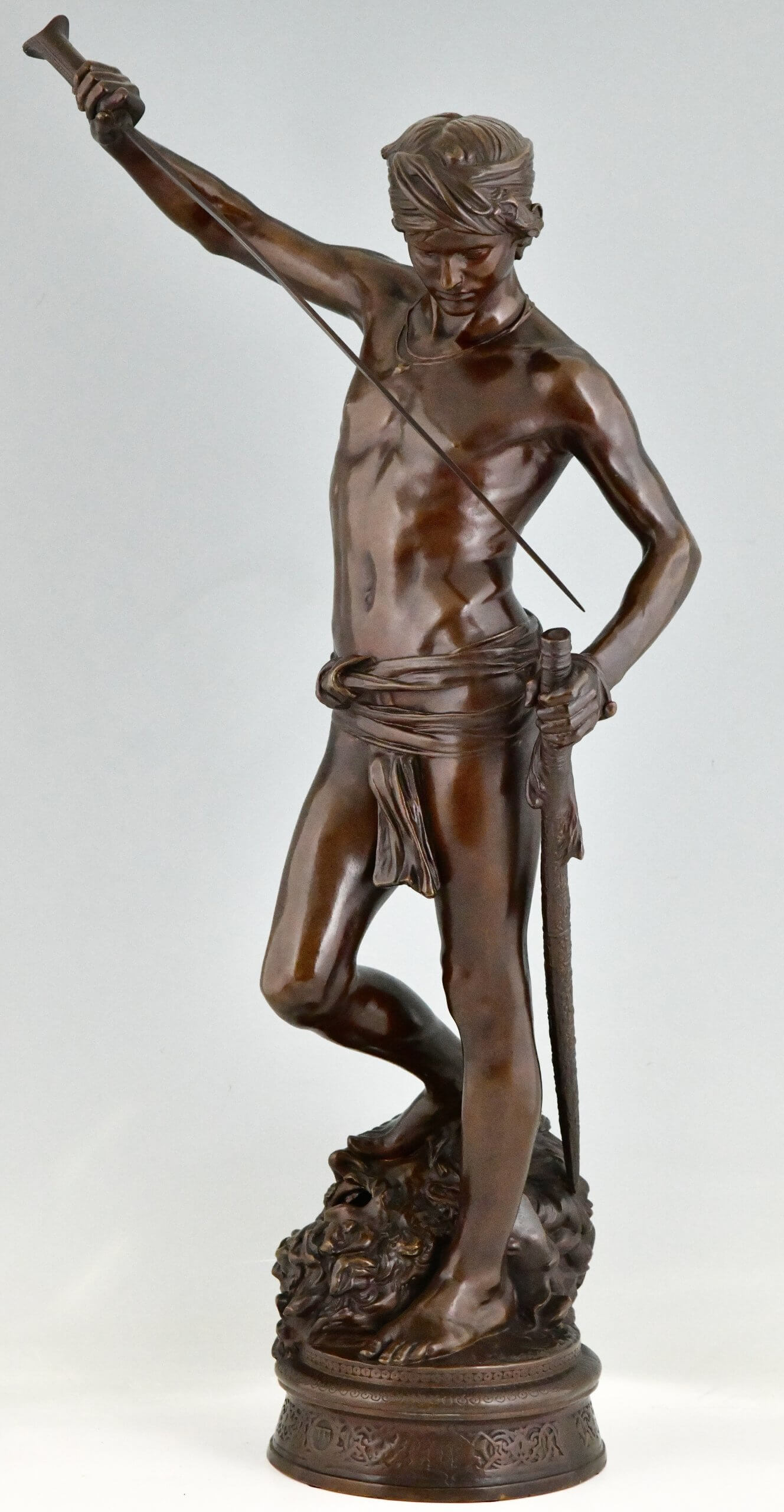Antique bronze sculpture David after the combat.