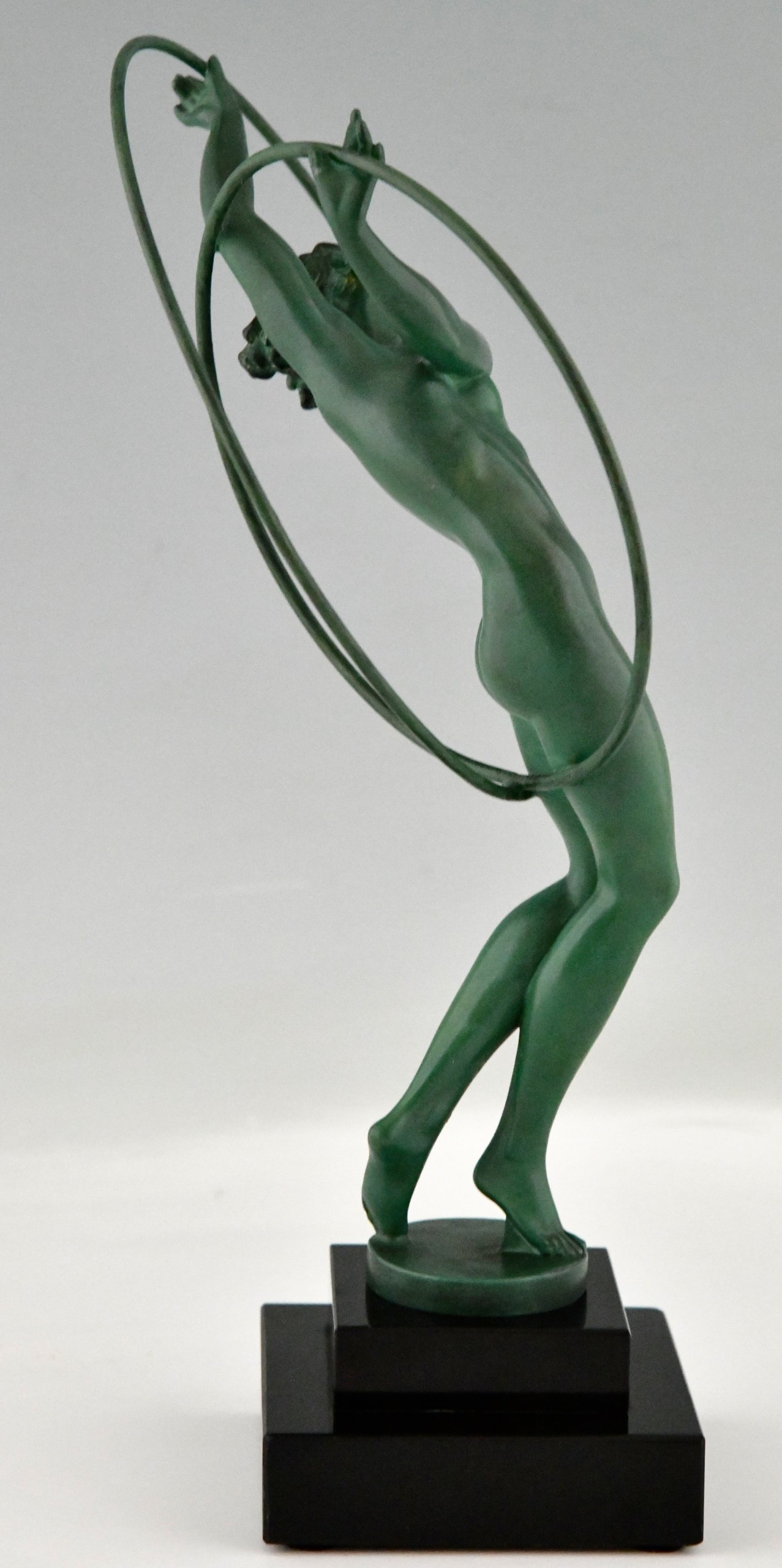 Art Deco sculpture nude hoop dancer.