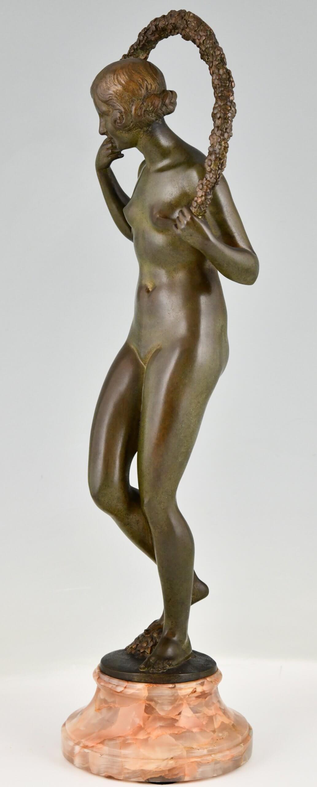 Art Deco bronzen sculptuur naakt met guirlande