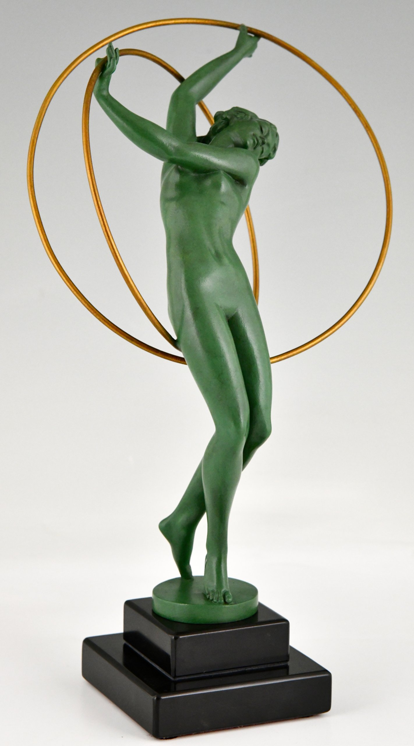 Art Deco sculpture nude hoop dancer.