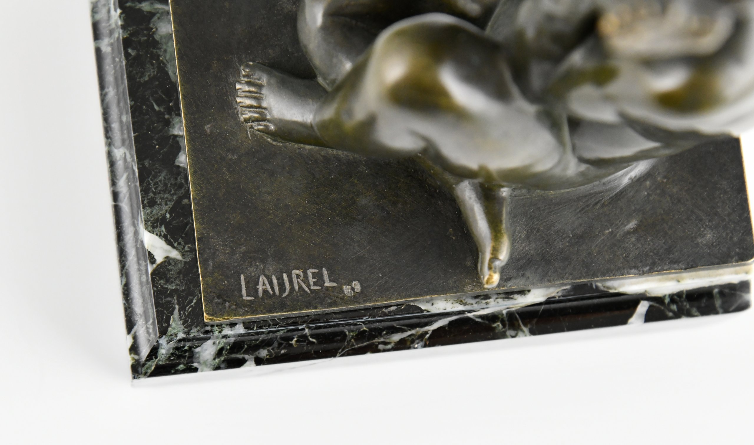 Art Deco bronzen boekensteunen faun en meisje