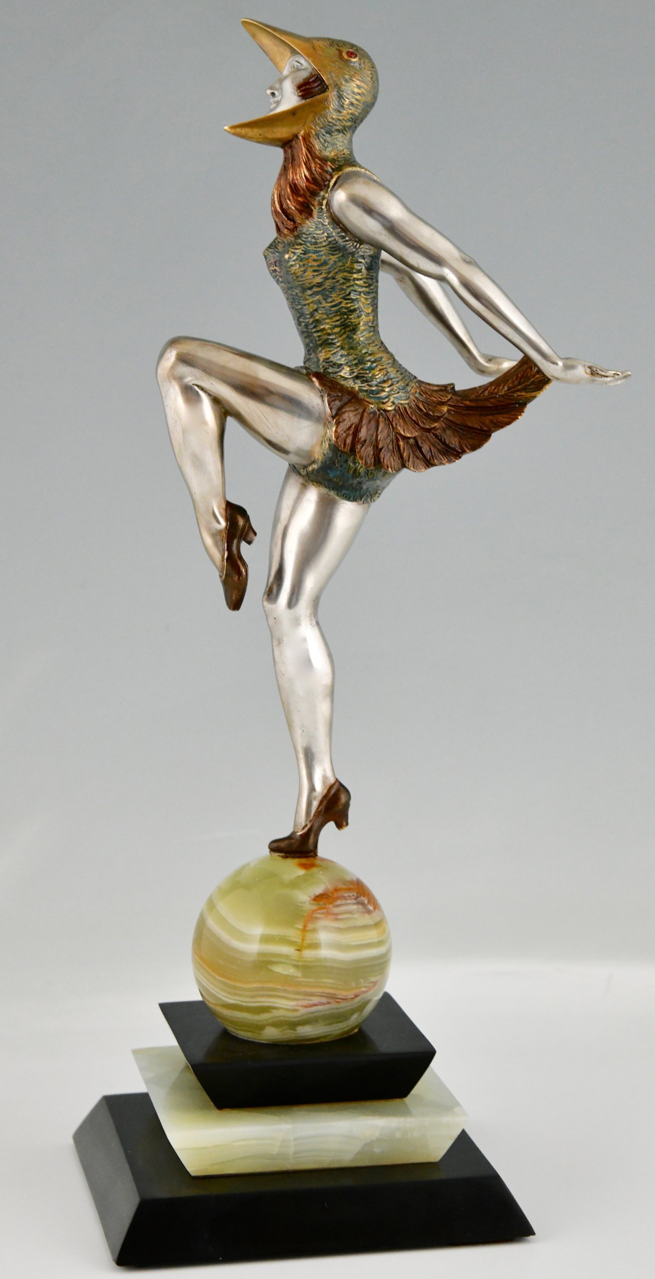 Art Deco bronze sculpture dancer in bird costume.