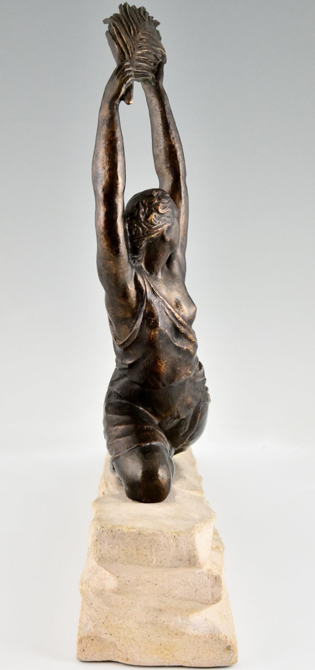 Art Deco sculpture female athlete with palm leaf.