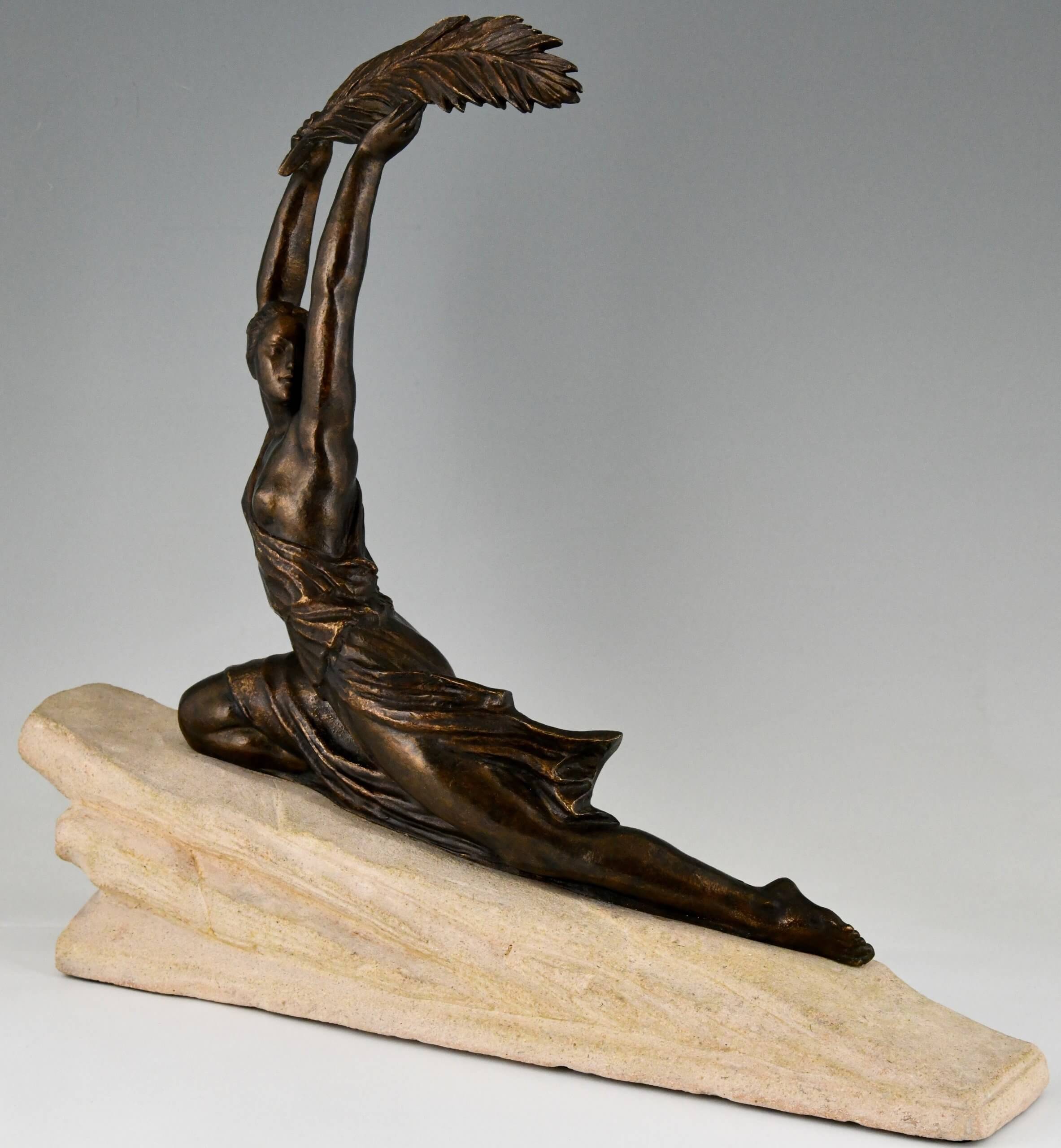 Art Deco bronze sculpture female athlete with palm leaf.