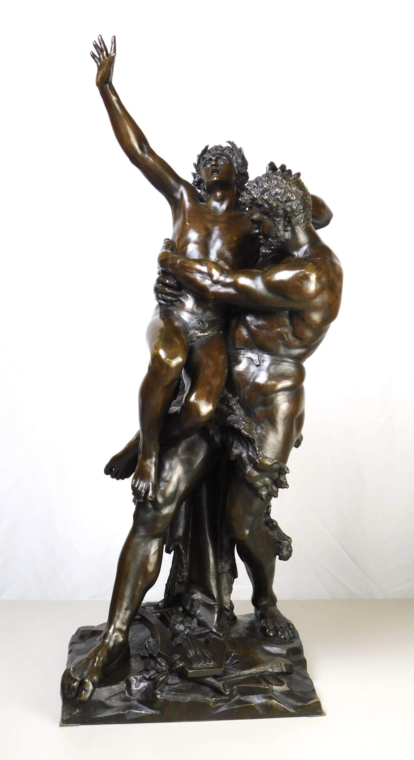 Antique bronze sculpture Genius and brute force.