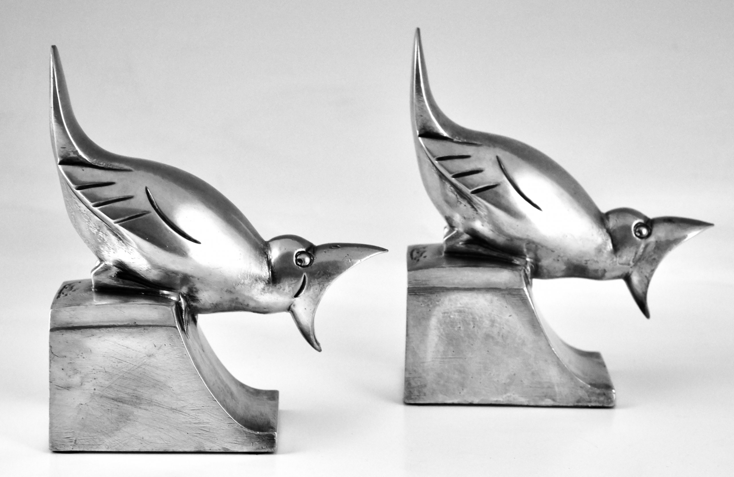 Art Deco bronzen boekensteunen met vogels
