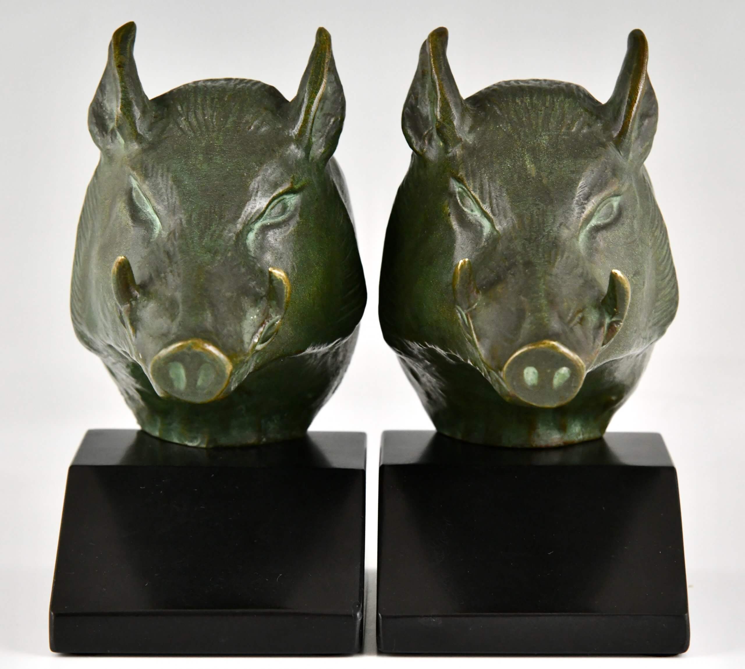 Art Deco Buchstützen aus Bronze mit Wildschweinköpfen