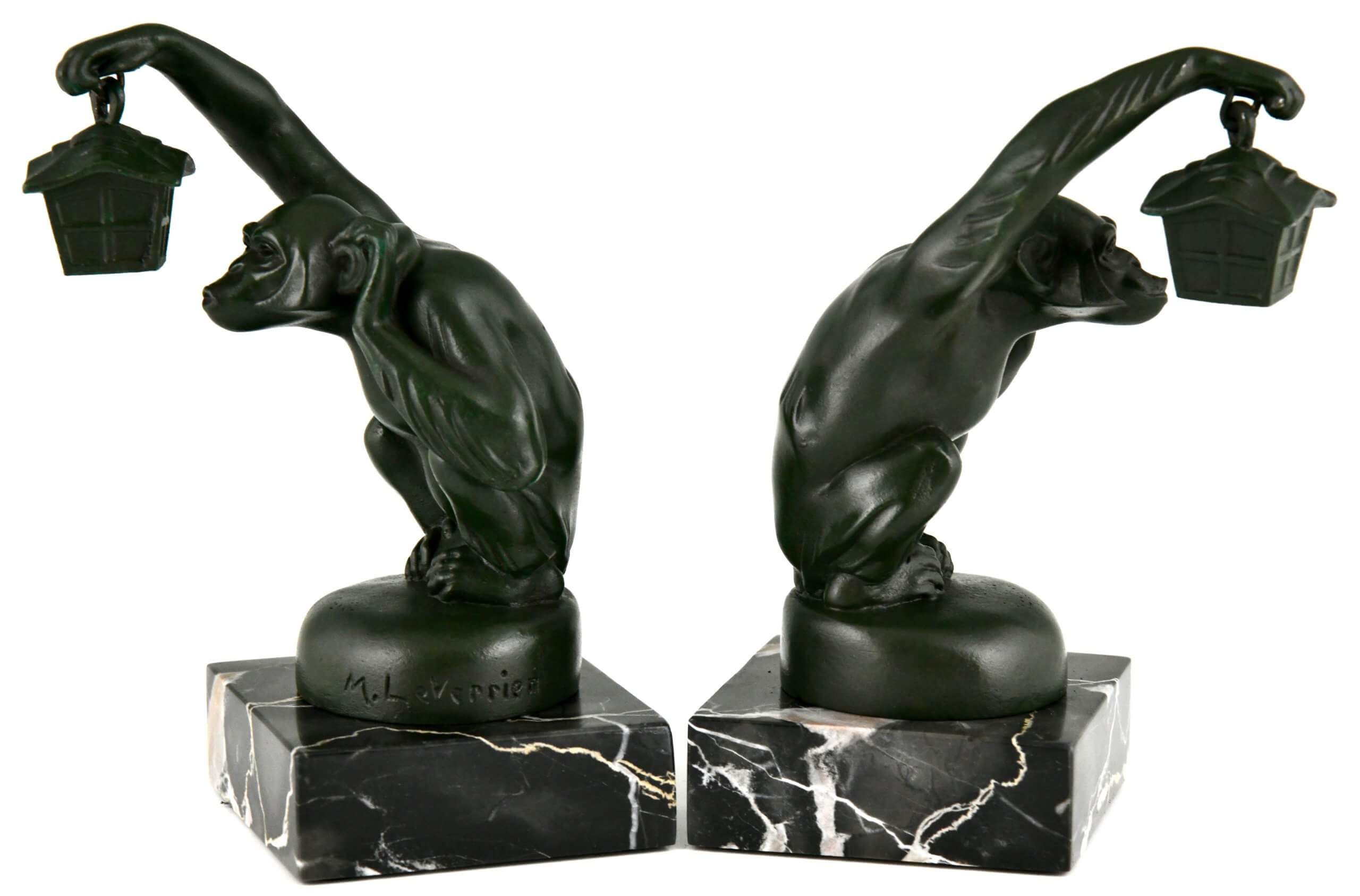 Art Deco bookends monkey with lantern.