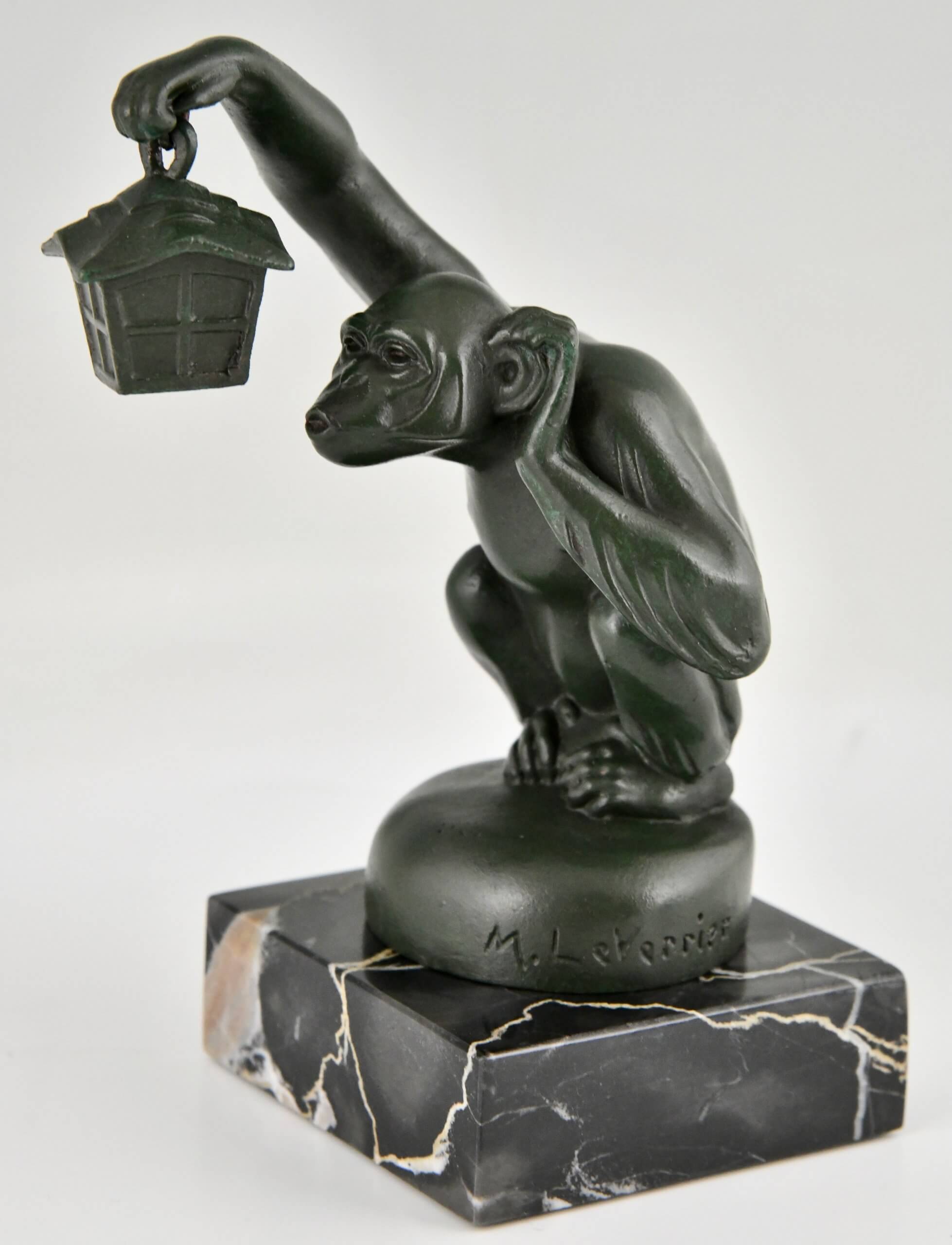 Art Deco Buchstützen Affe mit Laterne