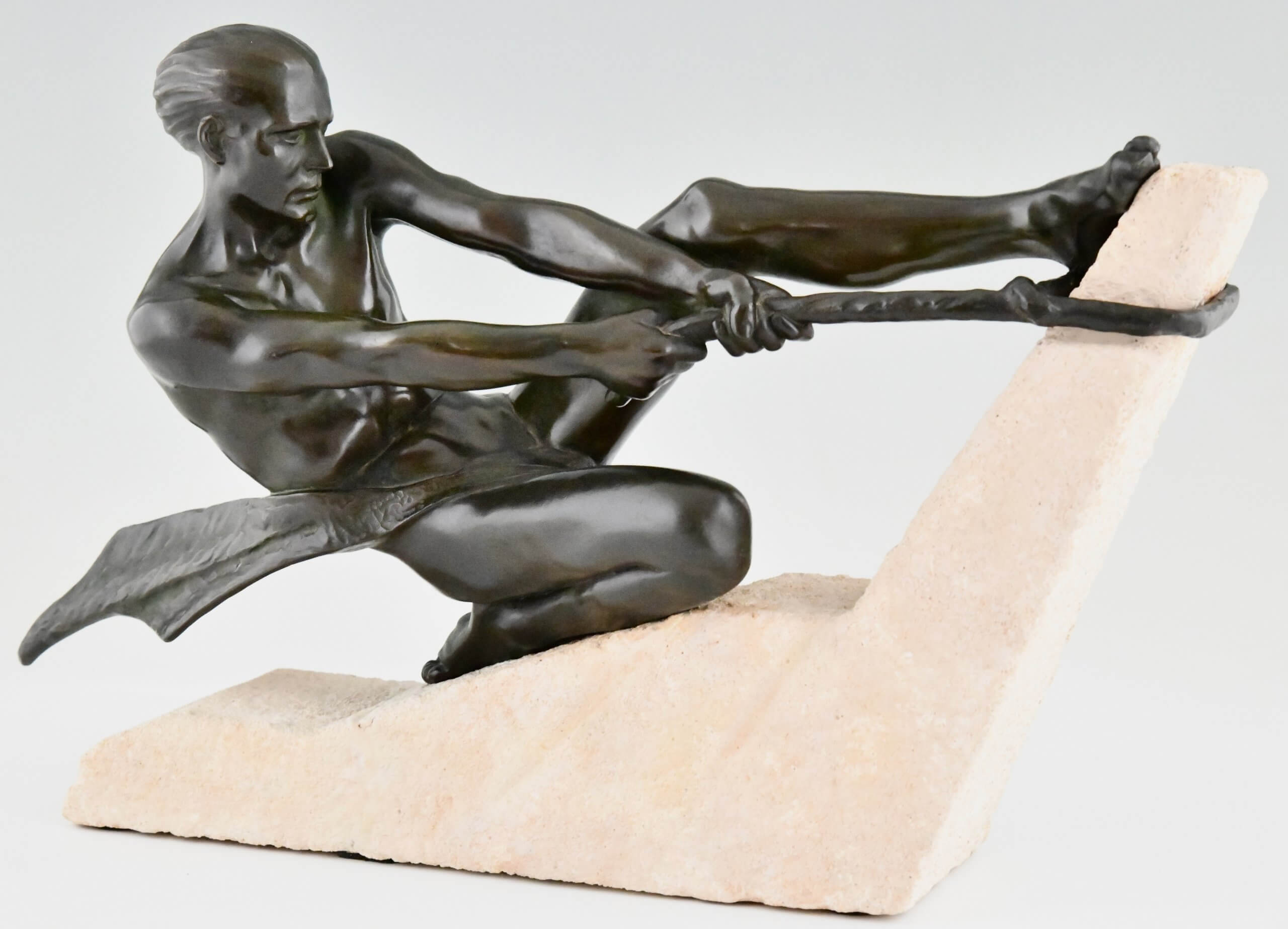 Art Deco sculpture athlete with rope.