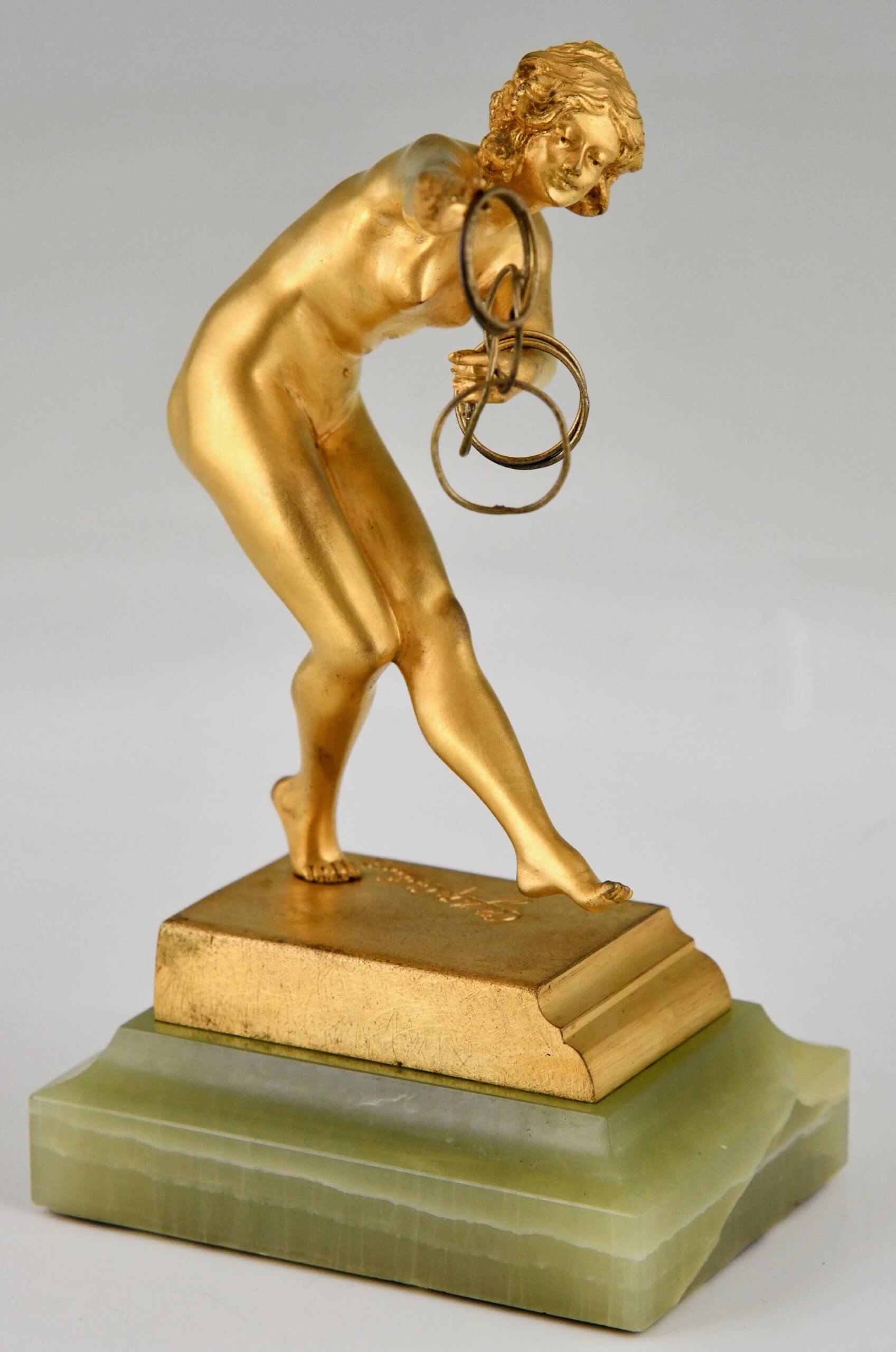 Art Deco bronze sculpture nude ring dancer. 