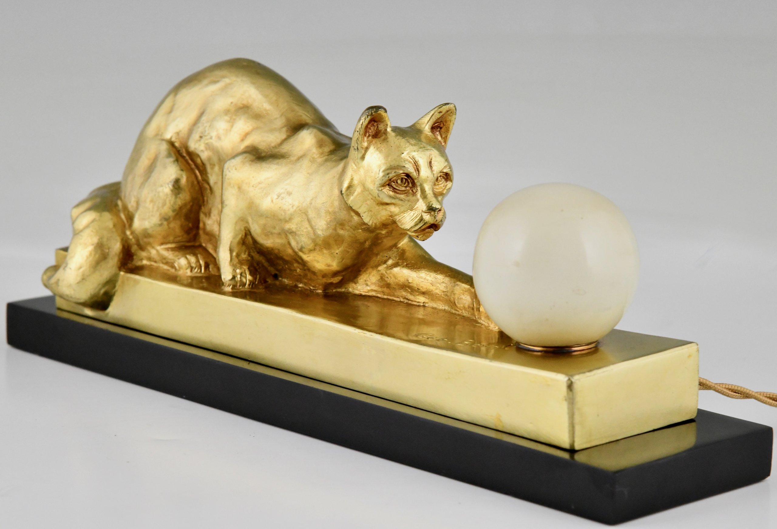 Art Deco bronze lamp sculpture cat with ball.