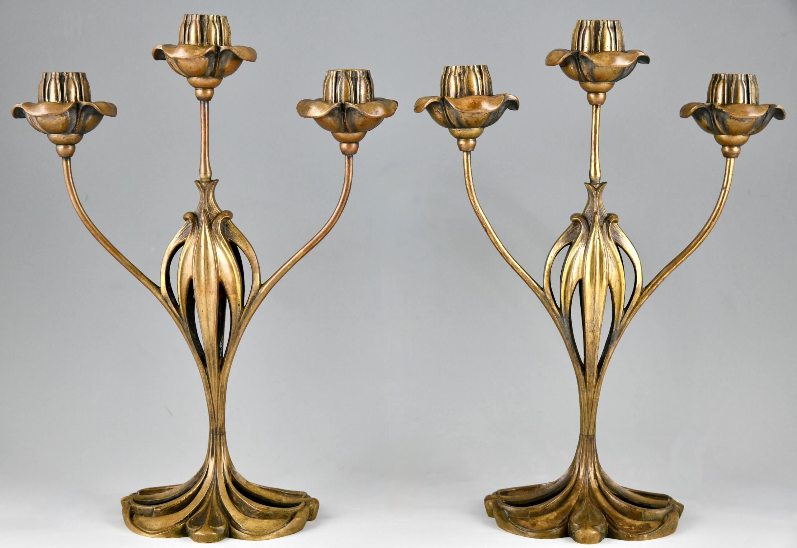 Pair of bronze Art Nouveau candelabra