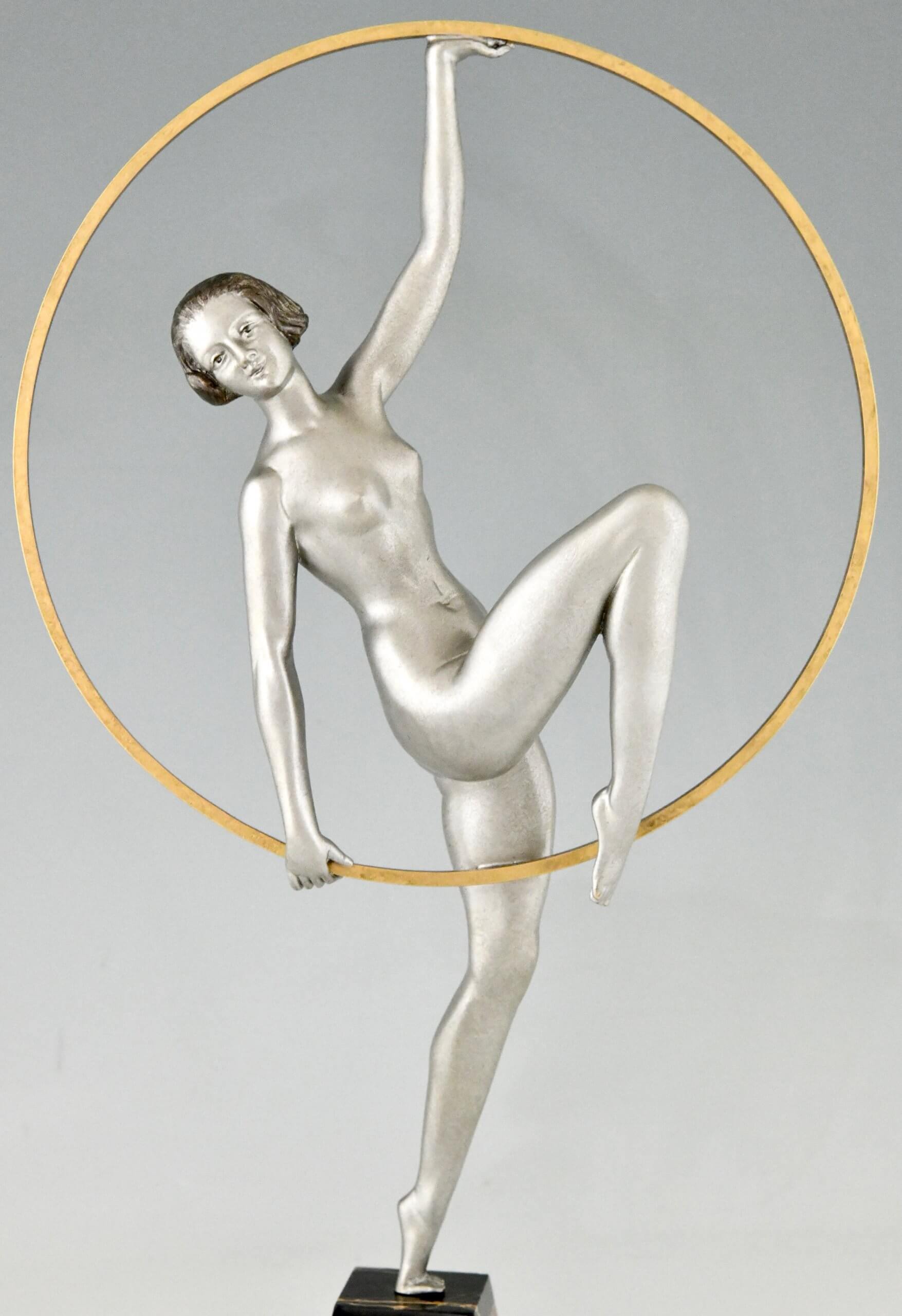 Art Deco sculpture hoop dancer.