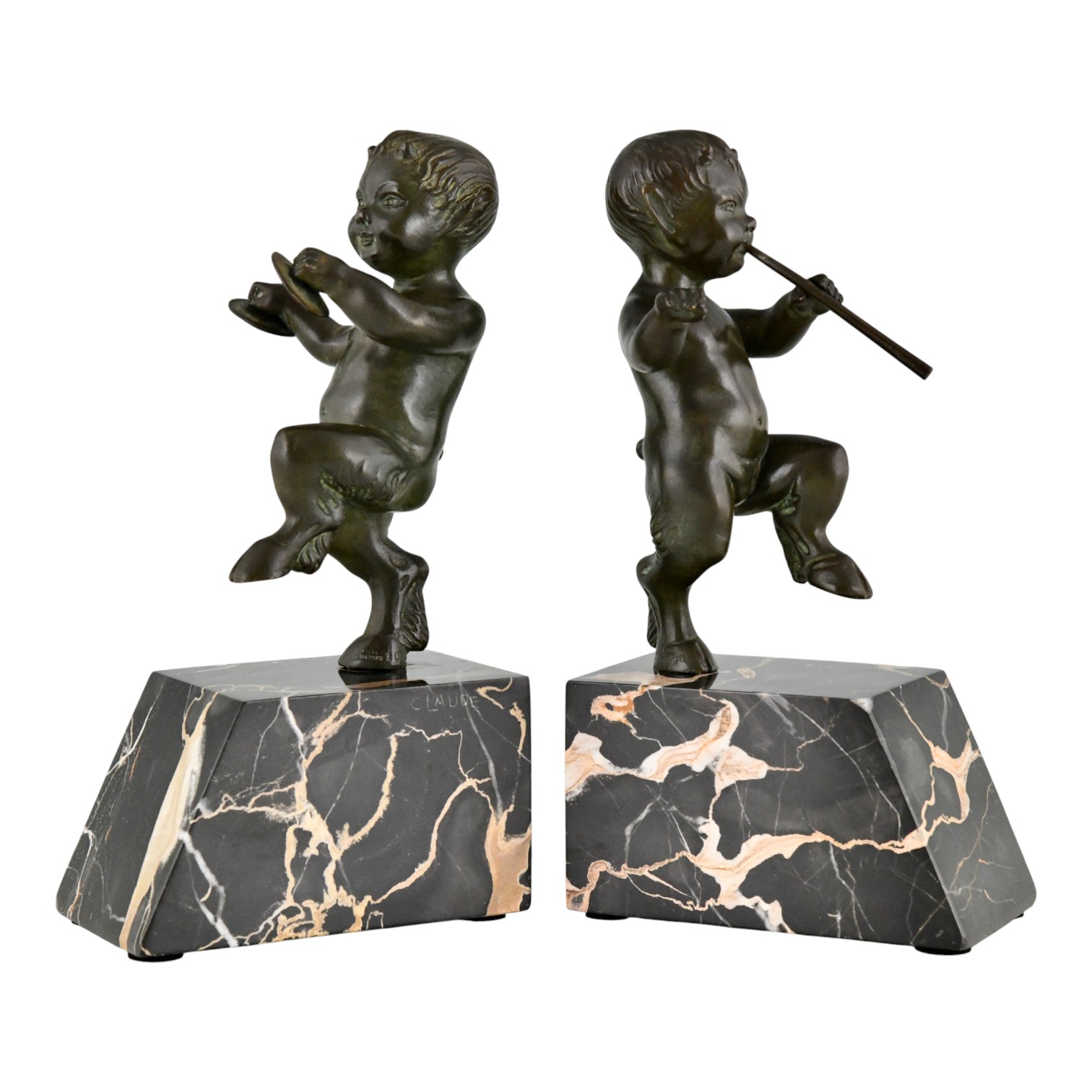 Art Deco bronze faun bookends. Art Deco bronze faun bookends.